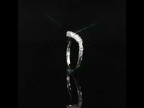 Upright side profile of a 14K white gold chevron band showing raised diamond settings and a smooth shank.