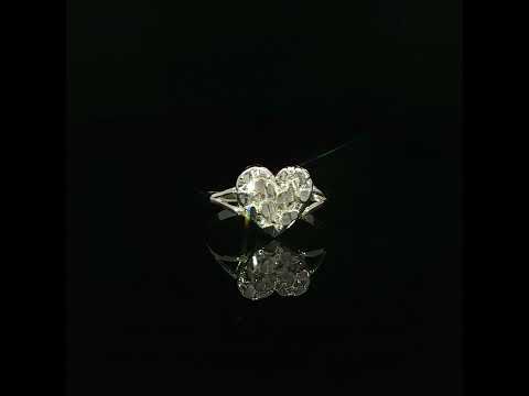 Flat profile of a 10K yellow gold heart nugget ring with a slim polished band.
