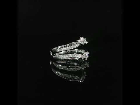 Floral diamond clusters frame the open center of a 0.38 CTW lab-grown diamond ring enhancer