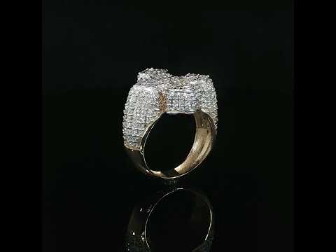 Yellow gold cross ring with 3.50 CTW of natural baguette and round diamonds.