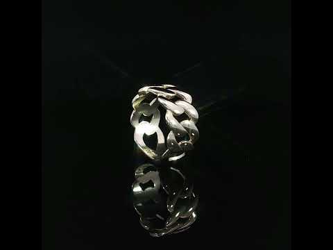 14K yellow gold Cuban link ring highlighting its interlocking chain pattern, polished metal surfaces, and open-link construction.