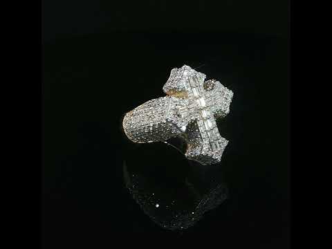 Front view of a bold yellow gold cross ring with diamond-covered shoulders and flared cross tips.