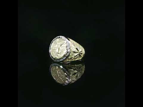 14K yellow gold Centenario-inspired ring with a raised round face and white border accents.