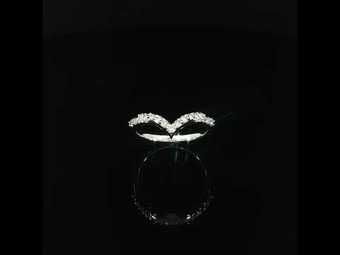 Video of a 0.29 CTW lab-grown diamond band with gently curved sides meeting at a central point.