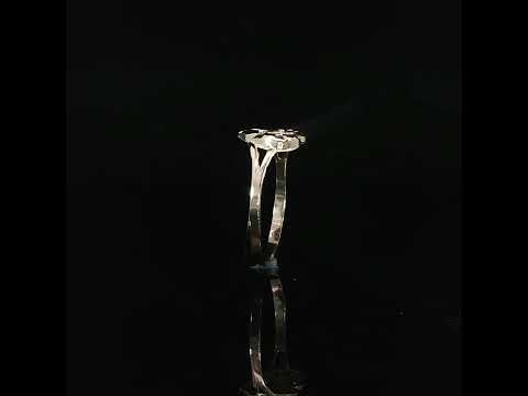 Side to side video of textured heart ring in 10K yellow gold with a reflection below.