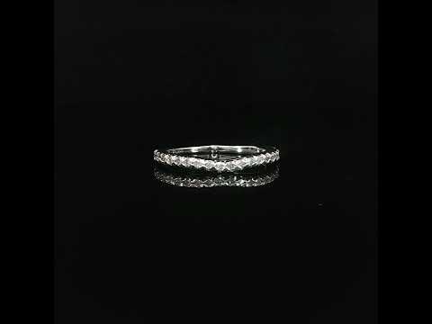 Close-up of a 14K white gold diamond contour wedding ring featuring round lab grown diamond accents totaling 0.25 carats.