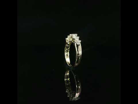 Upright video of yellow gold polished shoulders under a row of raised diamond clusters