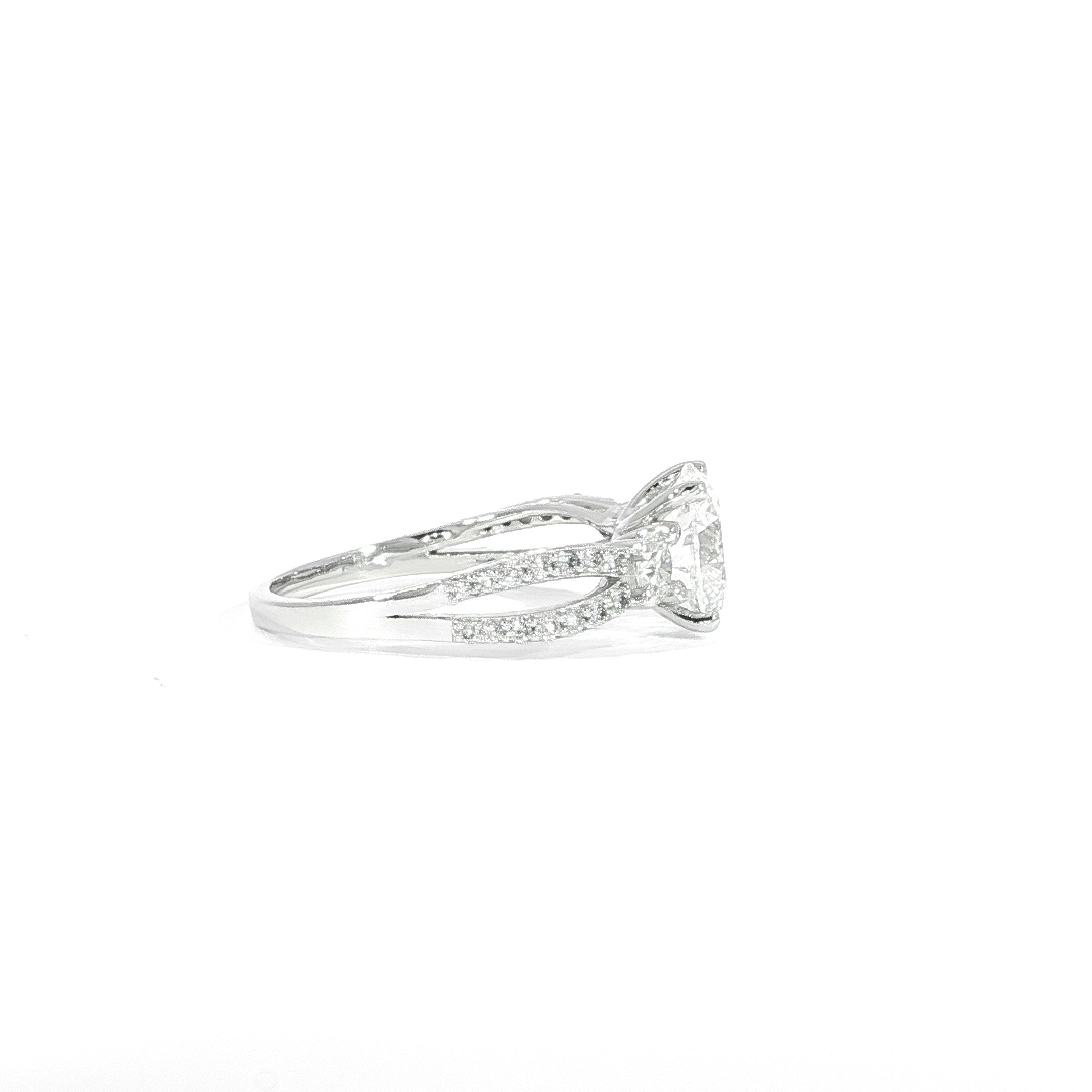 Side view of 14K gold round diamond engagement ring with split band