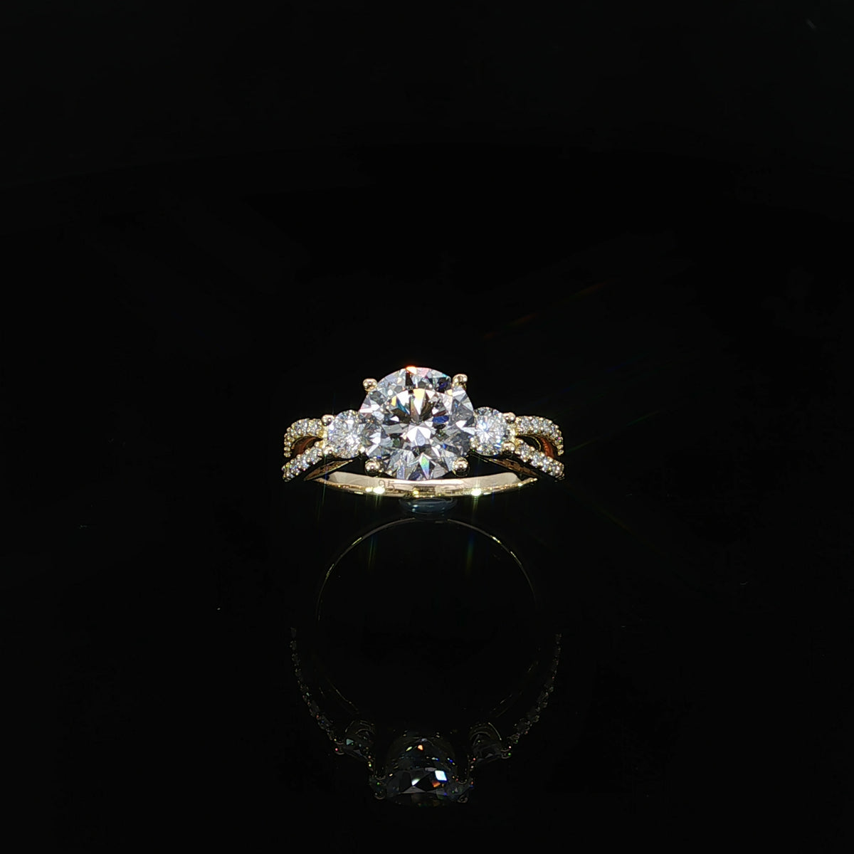 Angled profile of a round diamond ring with a diamond-set split shank
