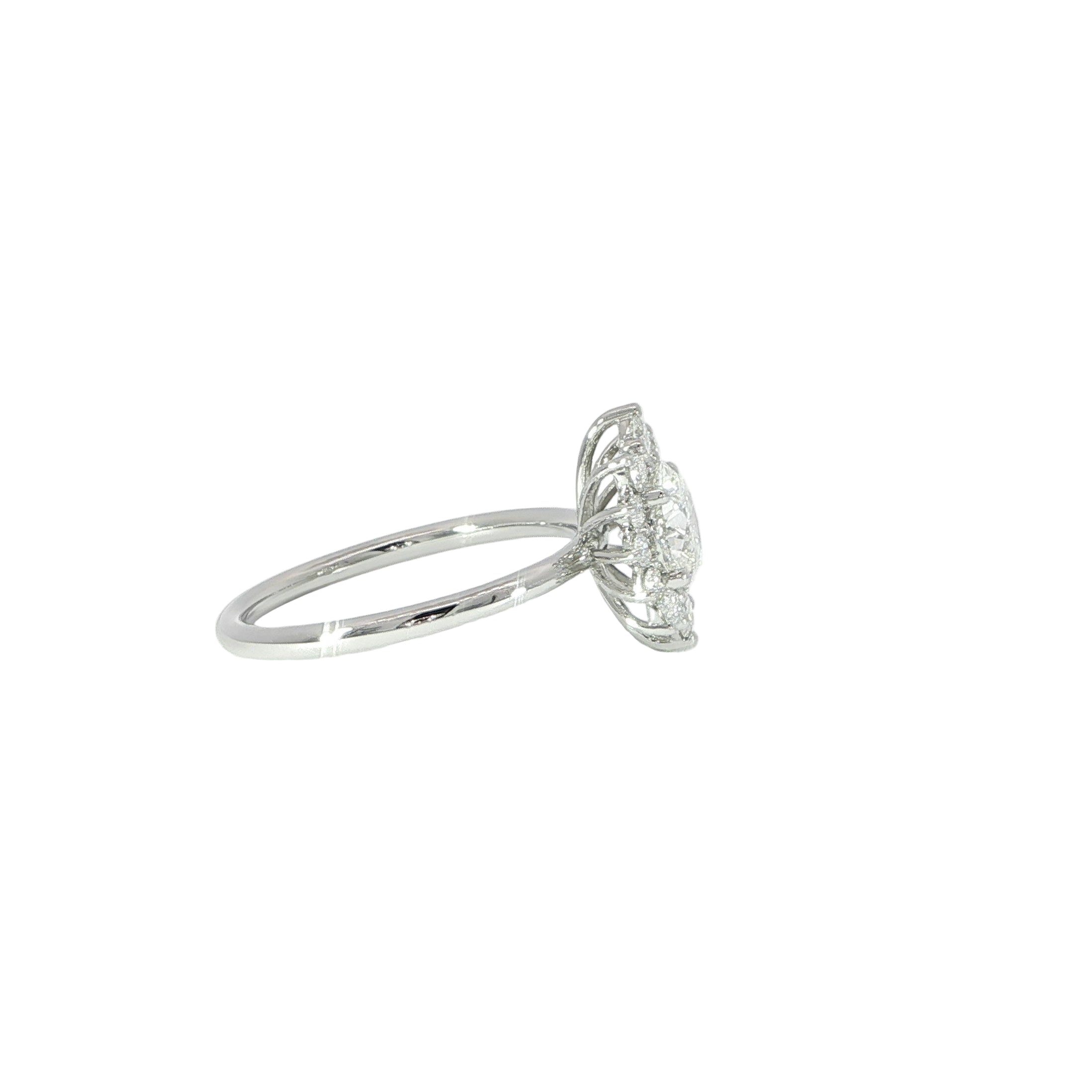 Round halo engagement ring with 1 CT center diamond side