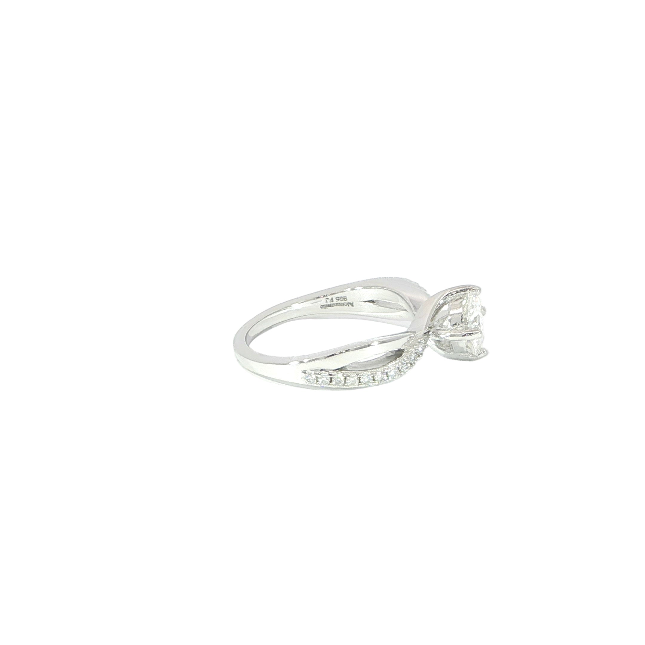 Classic round solitaire engagement ring with twisted pavé band