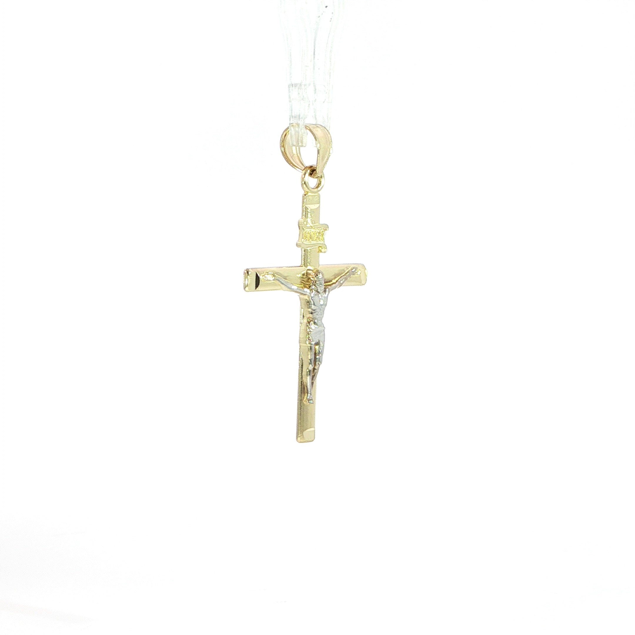 Two-tone high polish crucifix pendant crafted in 10K gold.
