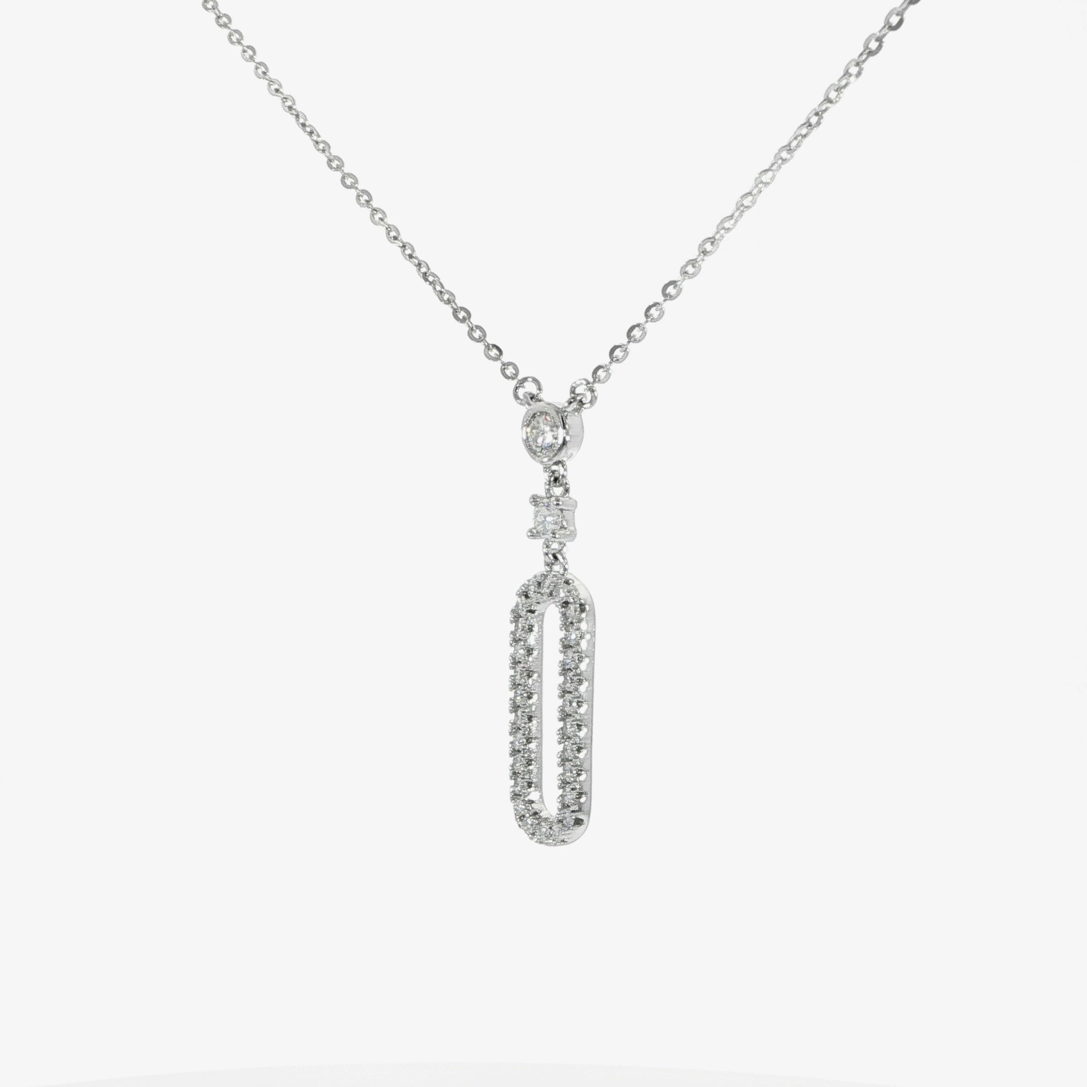 Elegant sterling silver necklace with paperclip-inspired design.