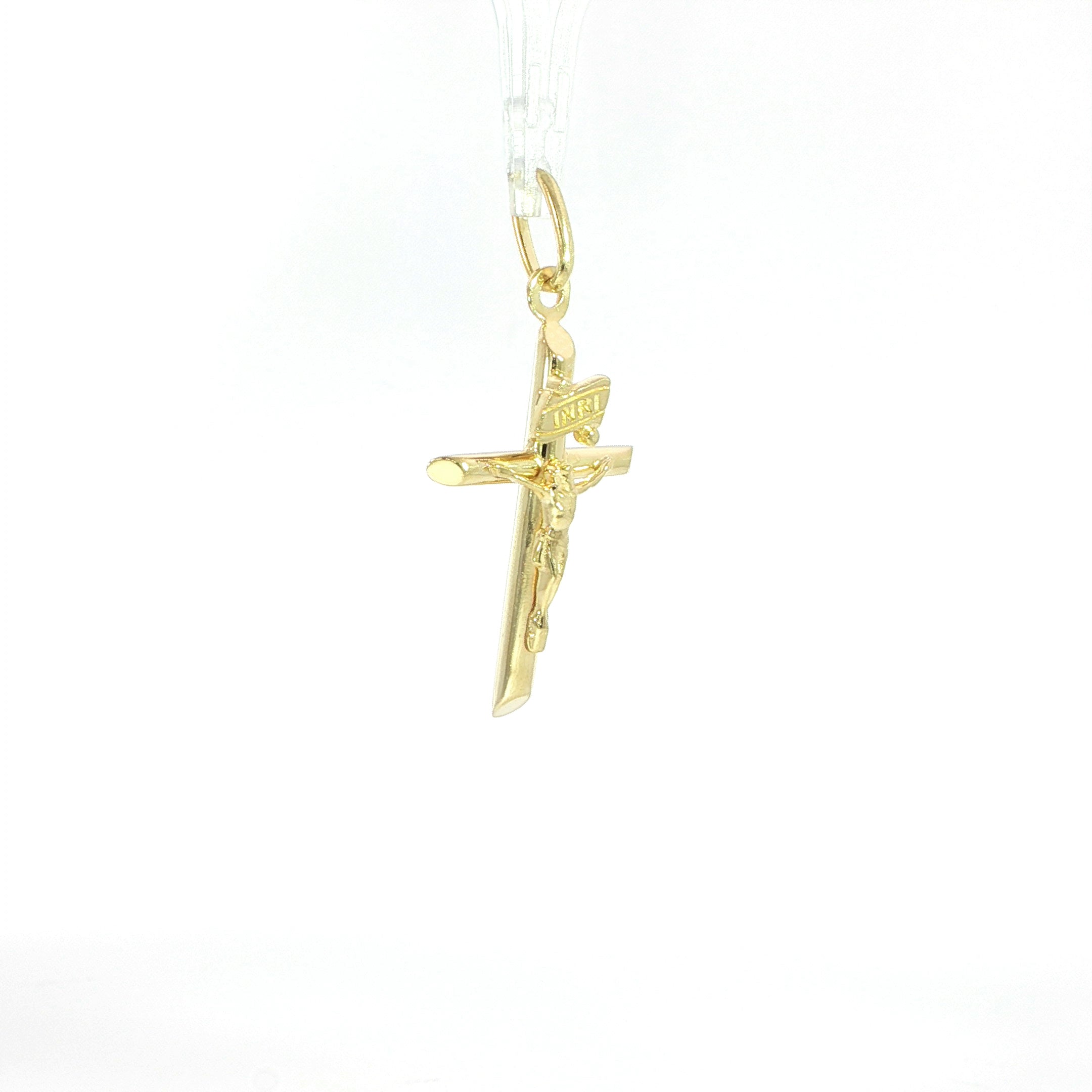 Traditional crucifix pendant crafted in genuine 10K yellow gold.