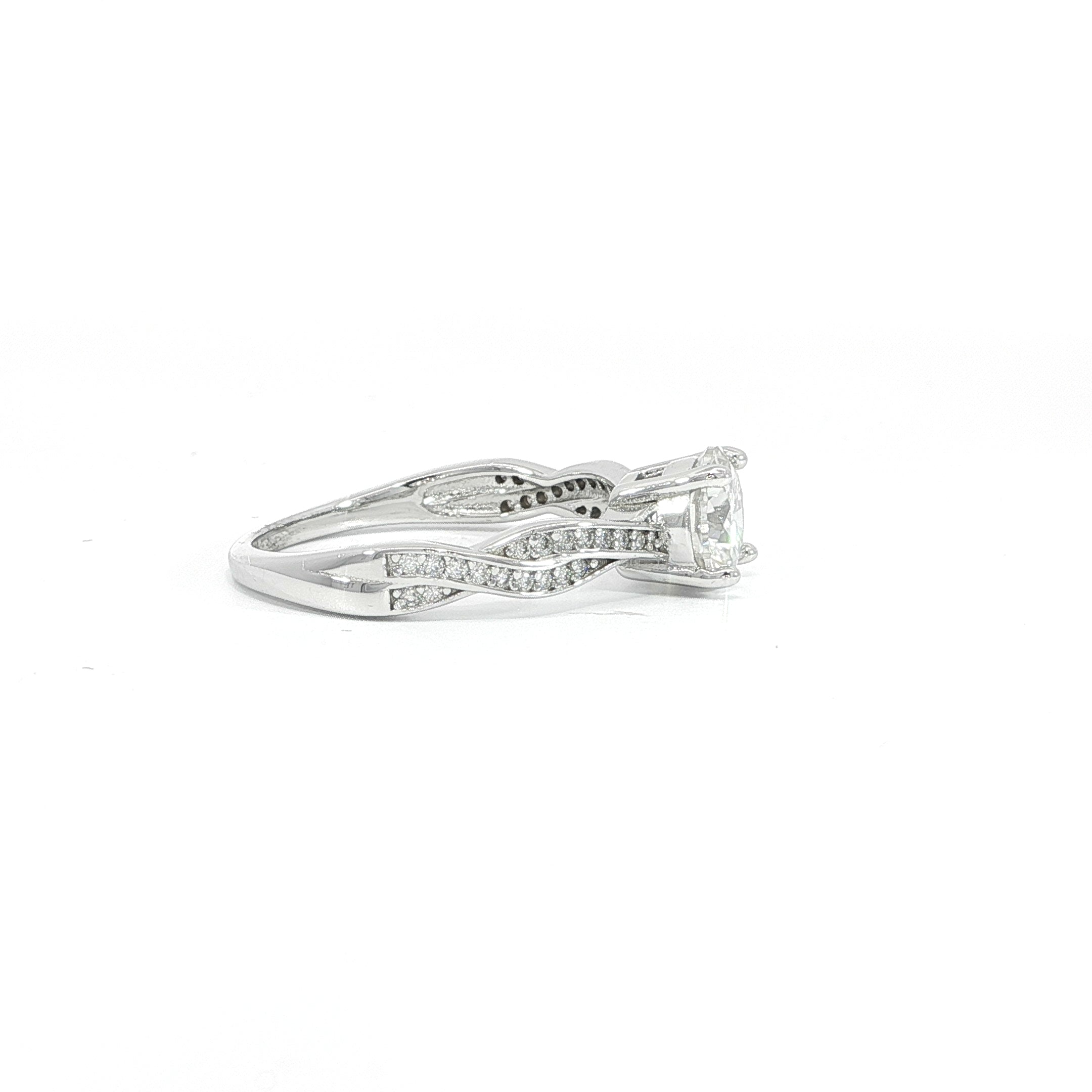 Infinity twist moissanite engagement ring with round center stone