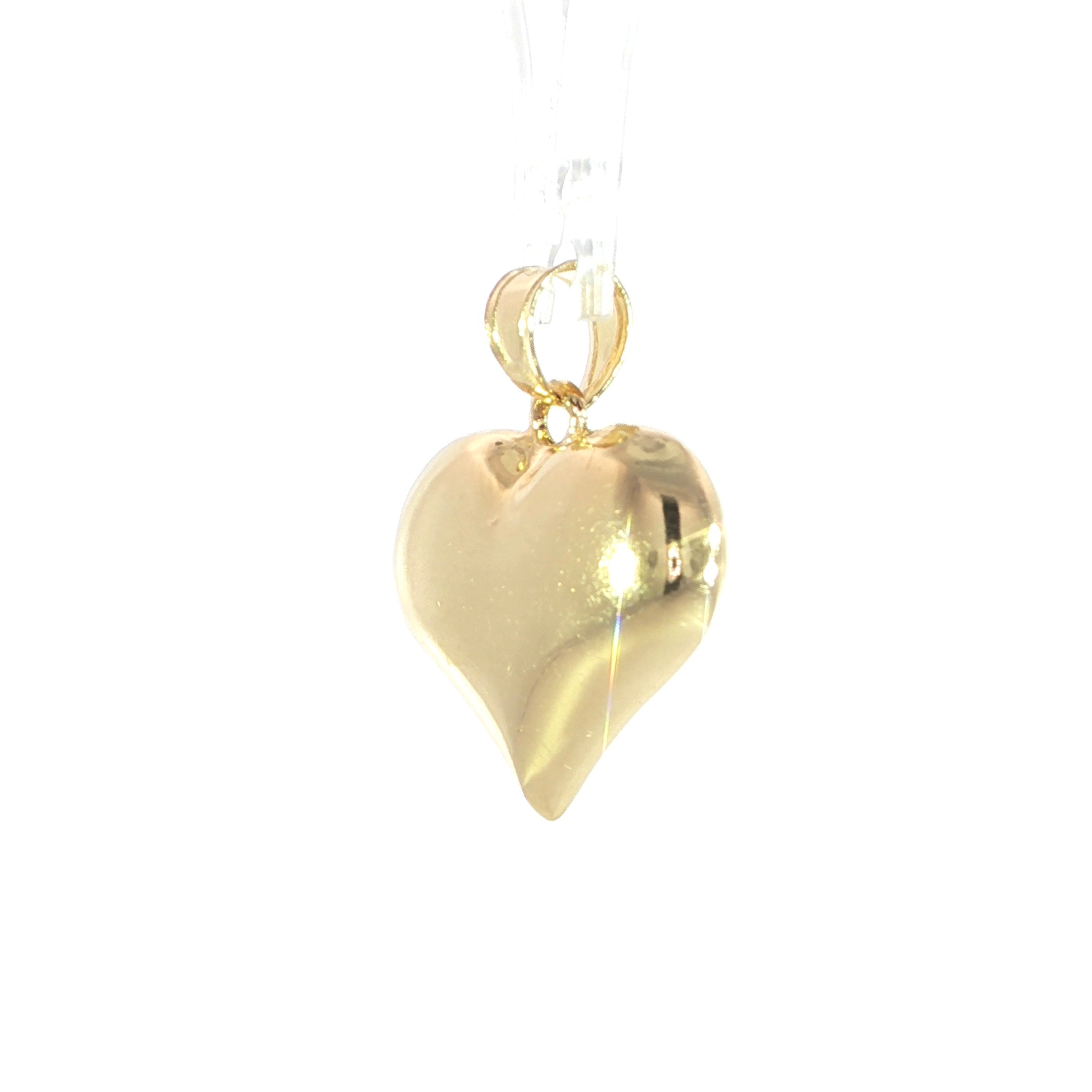 Tri color heart pendant in yellow white and rose gold