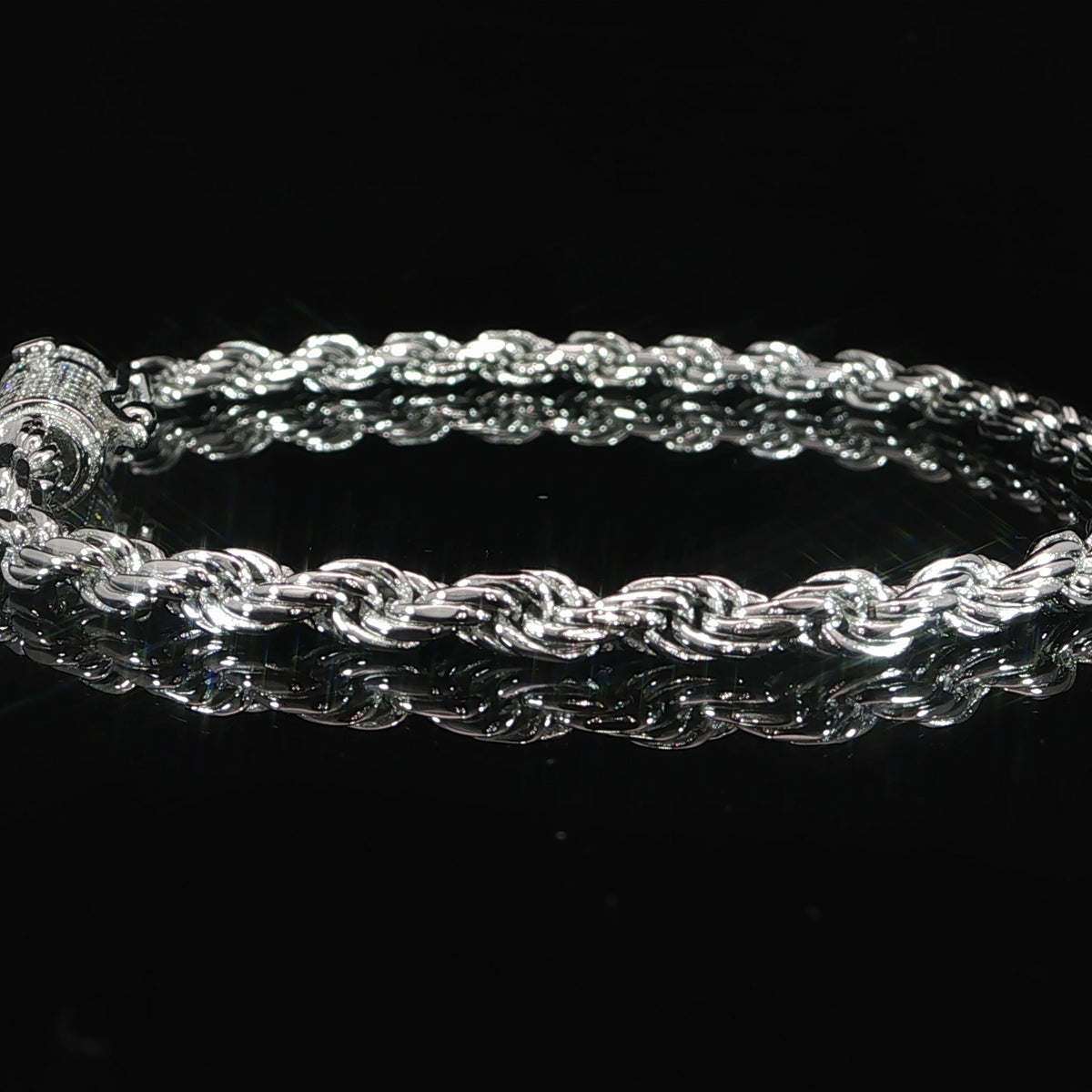 Close-up of the VVS moissanite box clasp on a silver rope bracelet