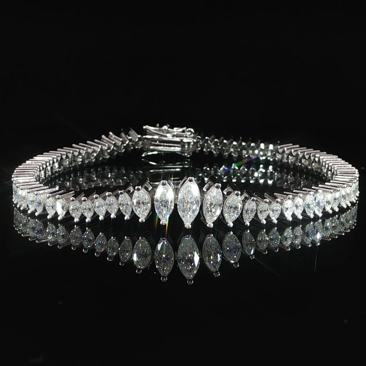 Front view of a sterling silver marquise-cut moissanite tennis bracelet