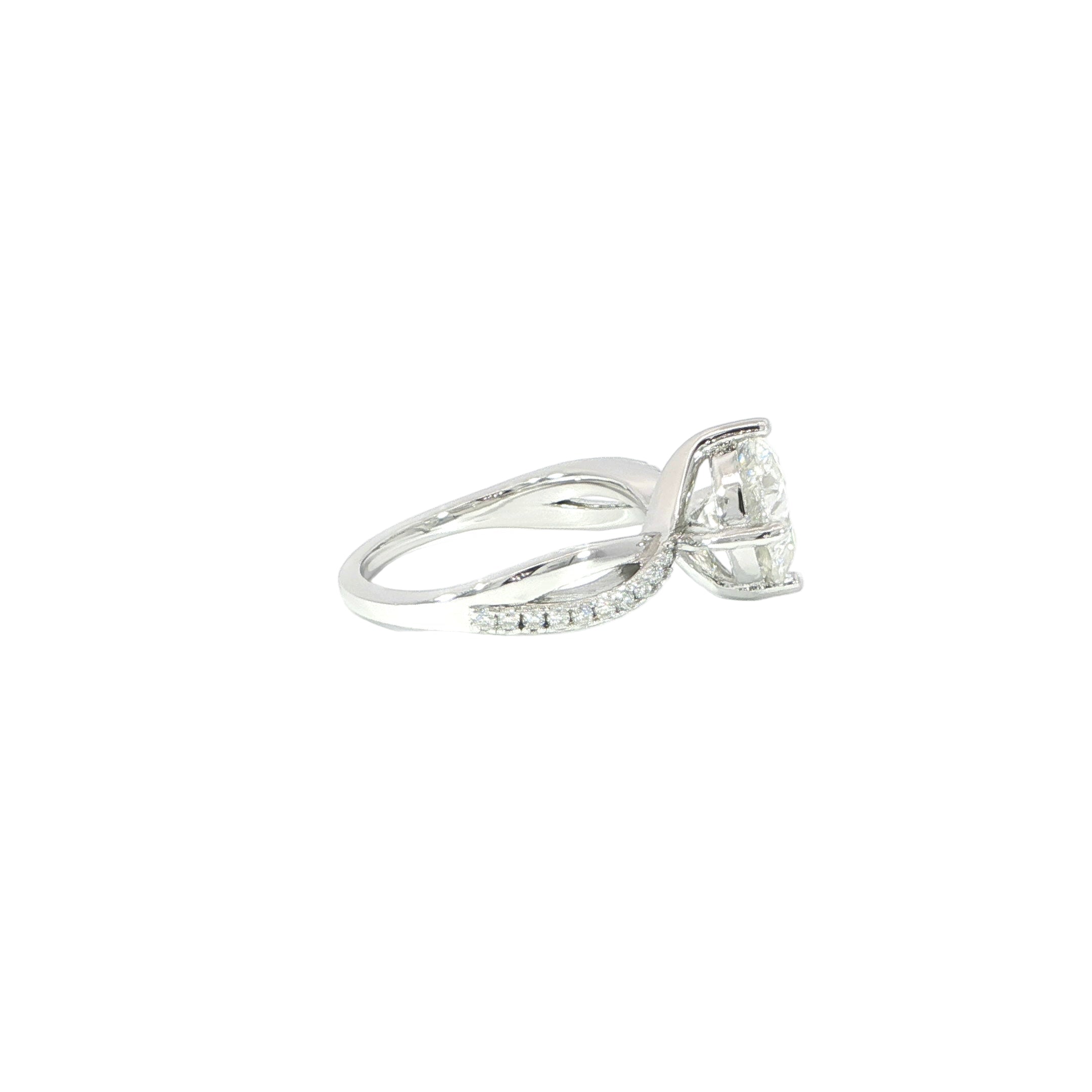 Modern sterling silver moissanite ring with flowing twist design