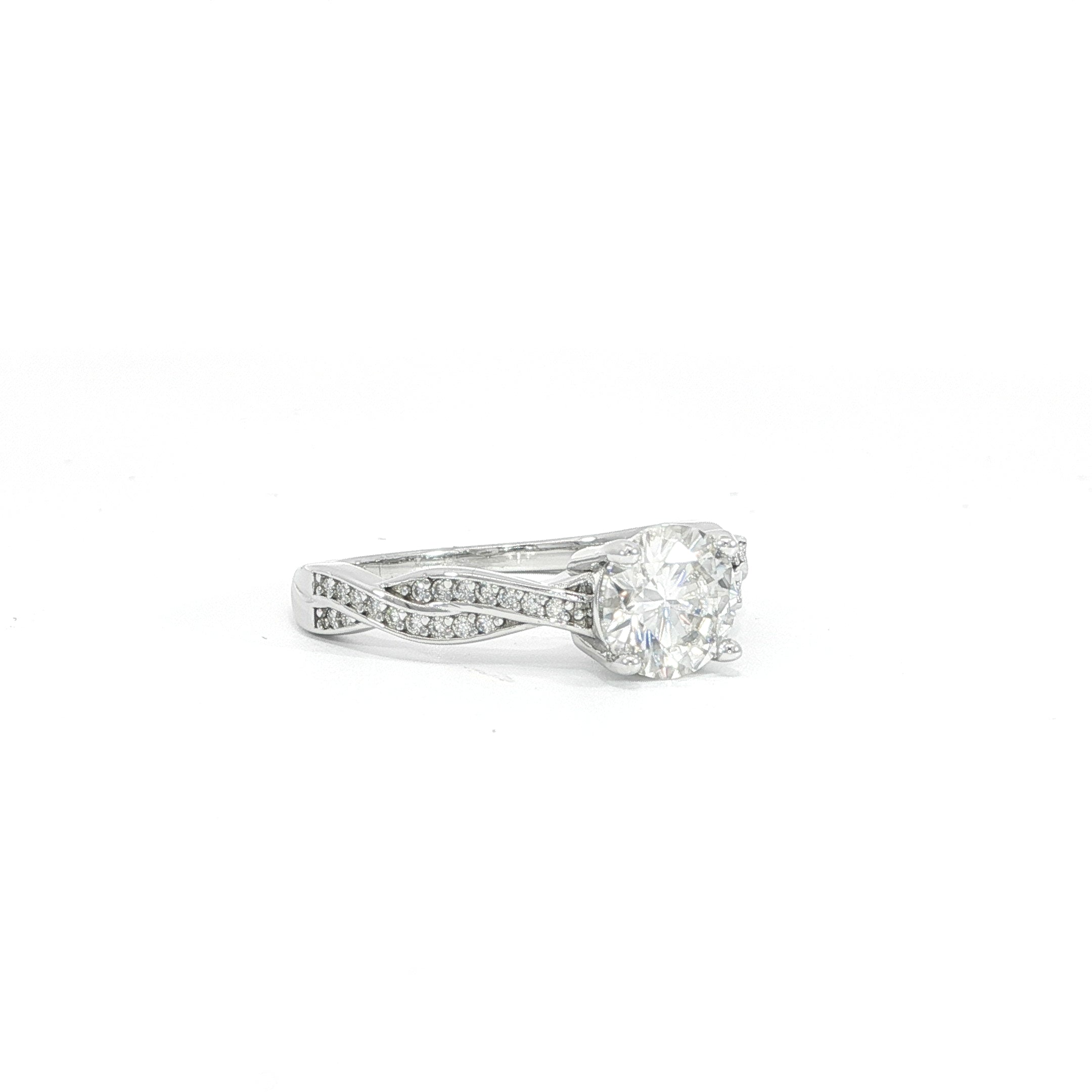 Classic four-prong moissanite engagement ring in 925 sterling silver