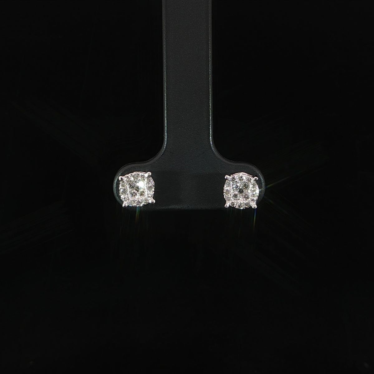 Close-up of SI-quality natural diamond cluster stud earrings