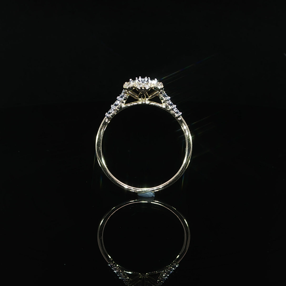 A 10K yellow gold 0.14 CTW natural diamond promise ring showing the floral head and polished lower band.