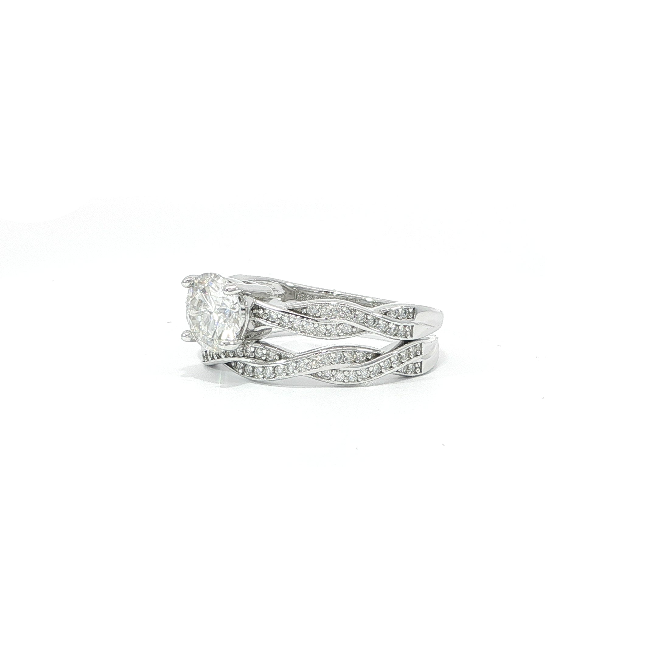 925 sterling silver twisted pavé wedding ring set with round VVS moissanite