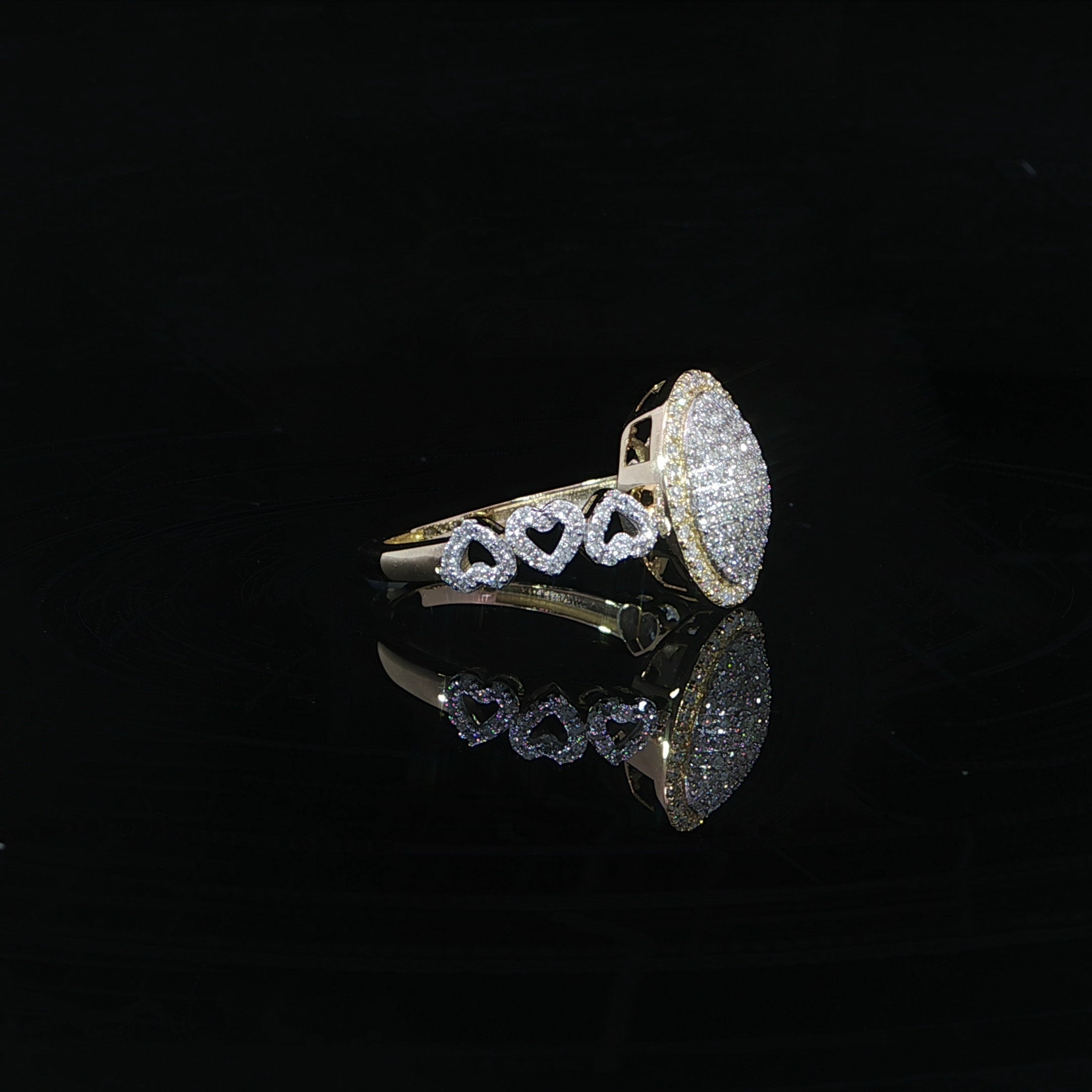 10K yellow gold statement ring with oval pavé natural diamond centerpiece