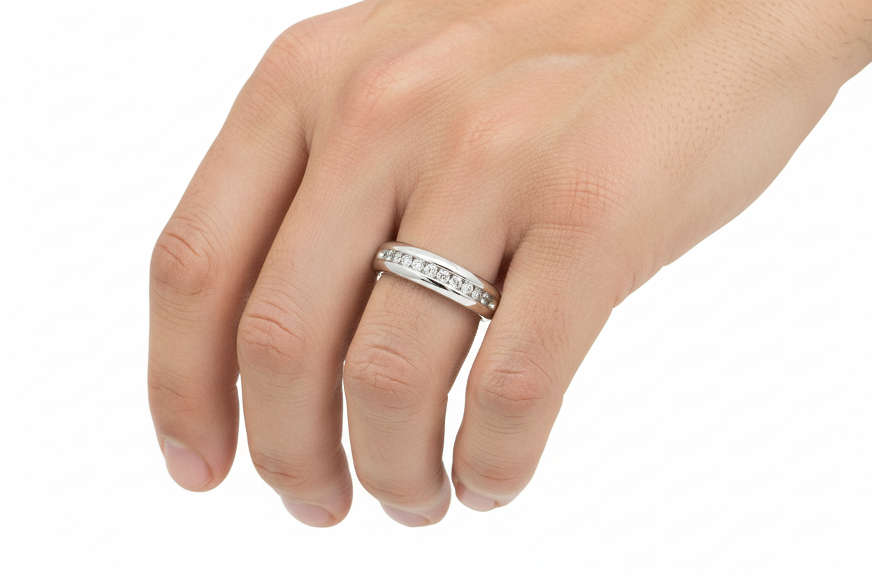 Model wearing white gold diamond band channel set