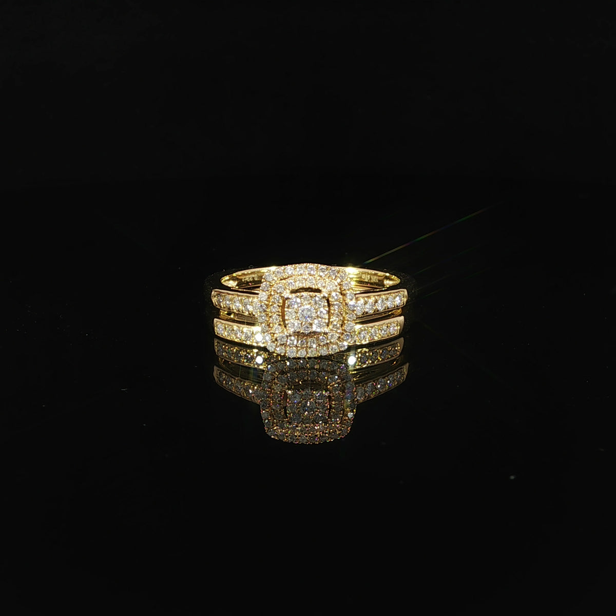 Front-facing 10K yellow gold natural diamond wedding set with a square cluster surrounded by two halos.