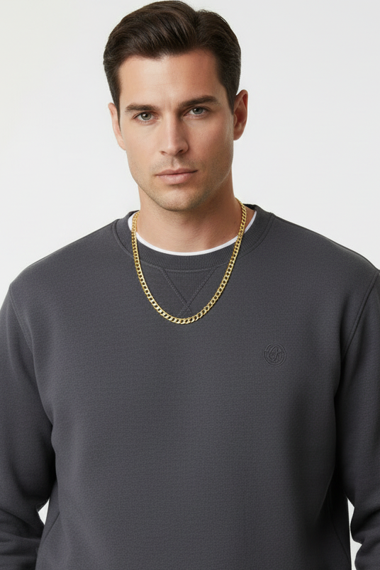 Model wearing 14K yellow gold Miami Cuban chain 7MM