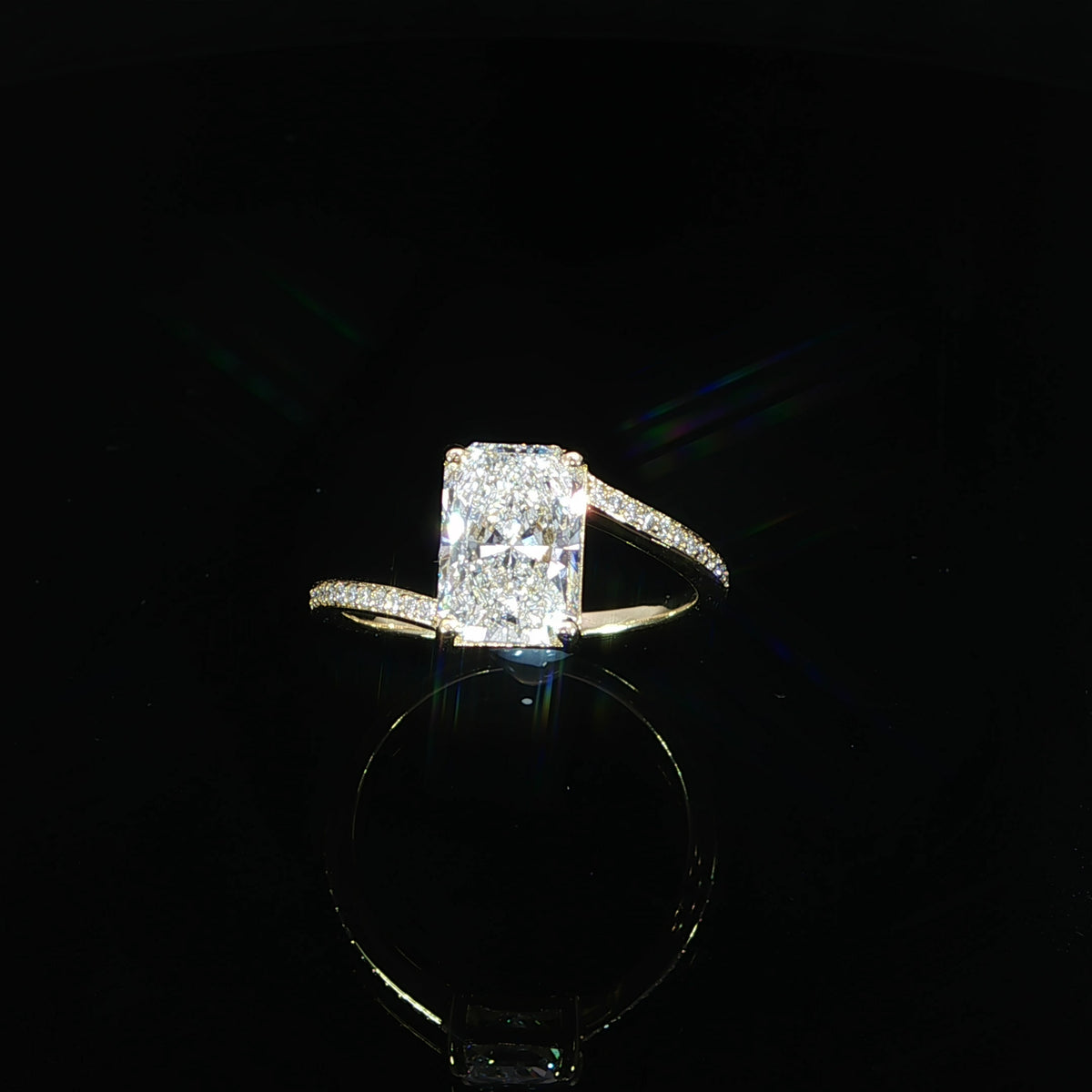 Close-up of the rectangular radiant-cut lab-grown center diamond
