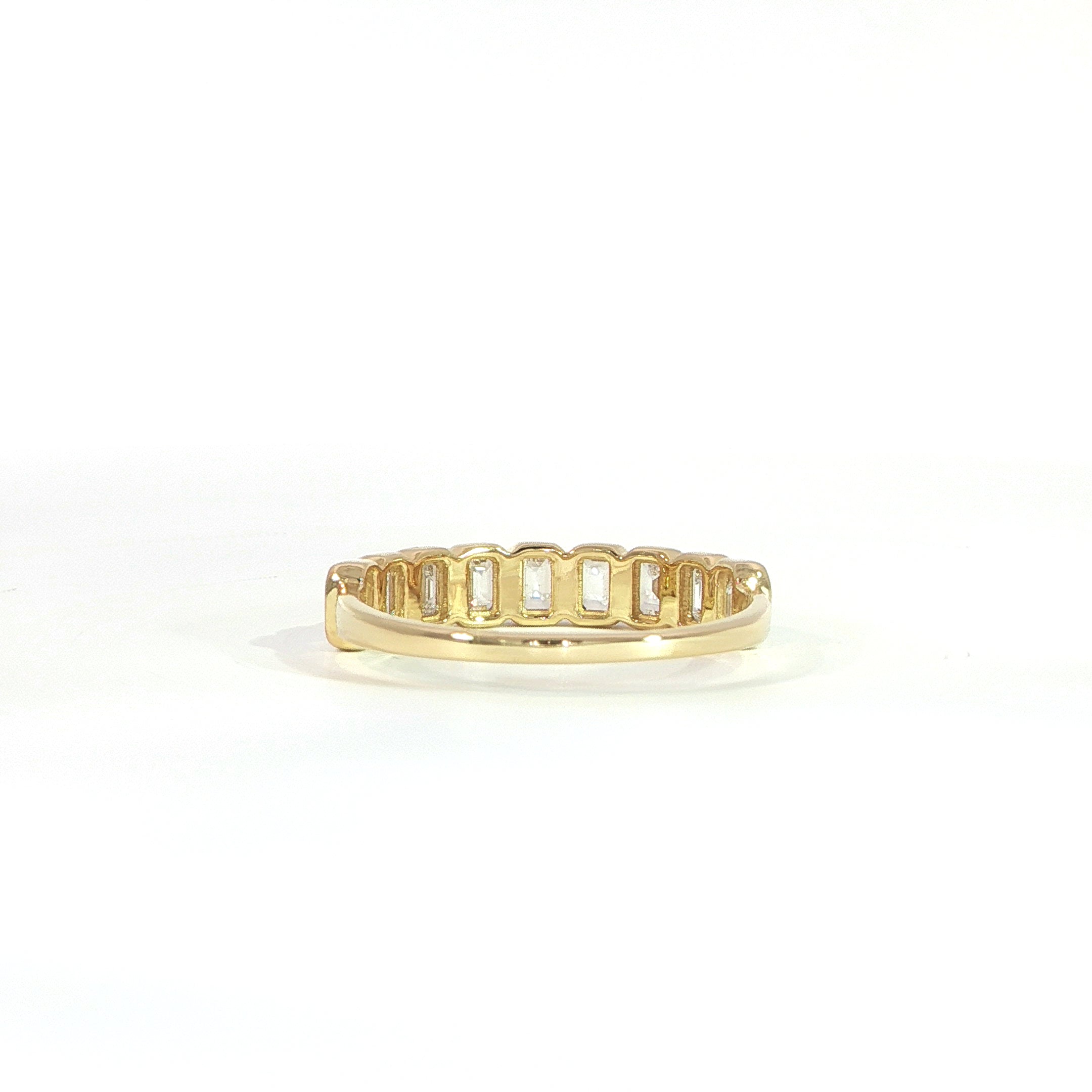 Back view of 14K gold emerald diamond band