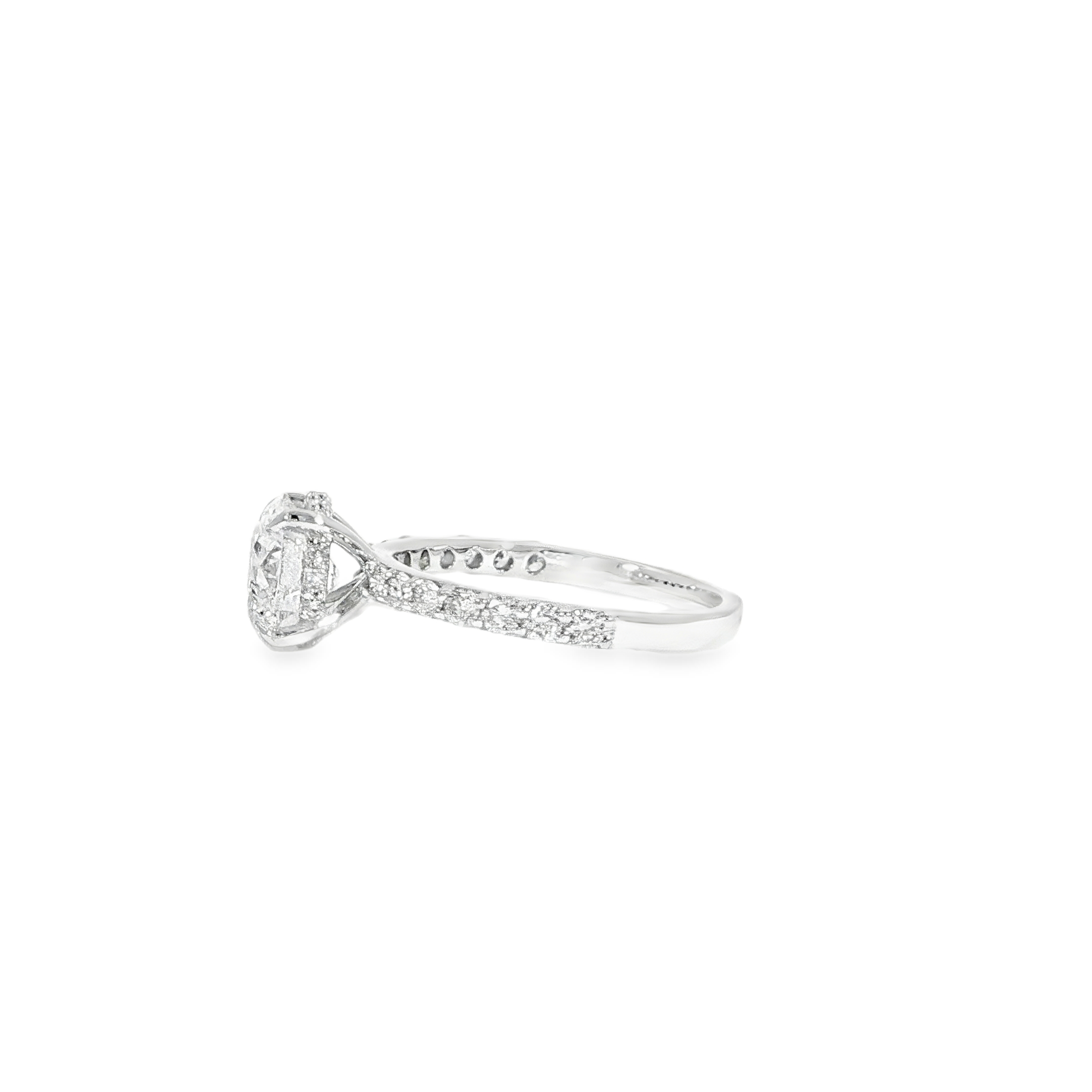 Hidden halo diamond ring with round center stone and pavé band
