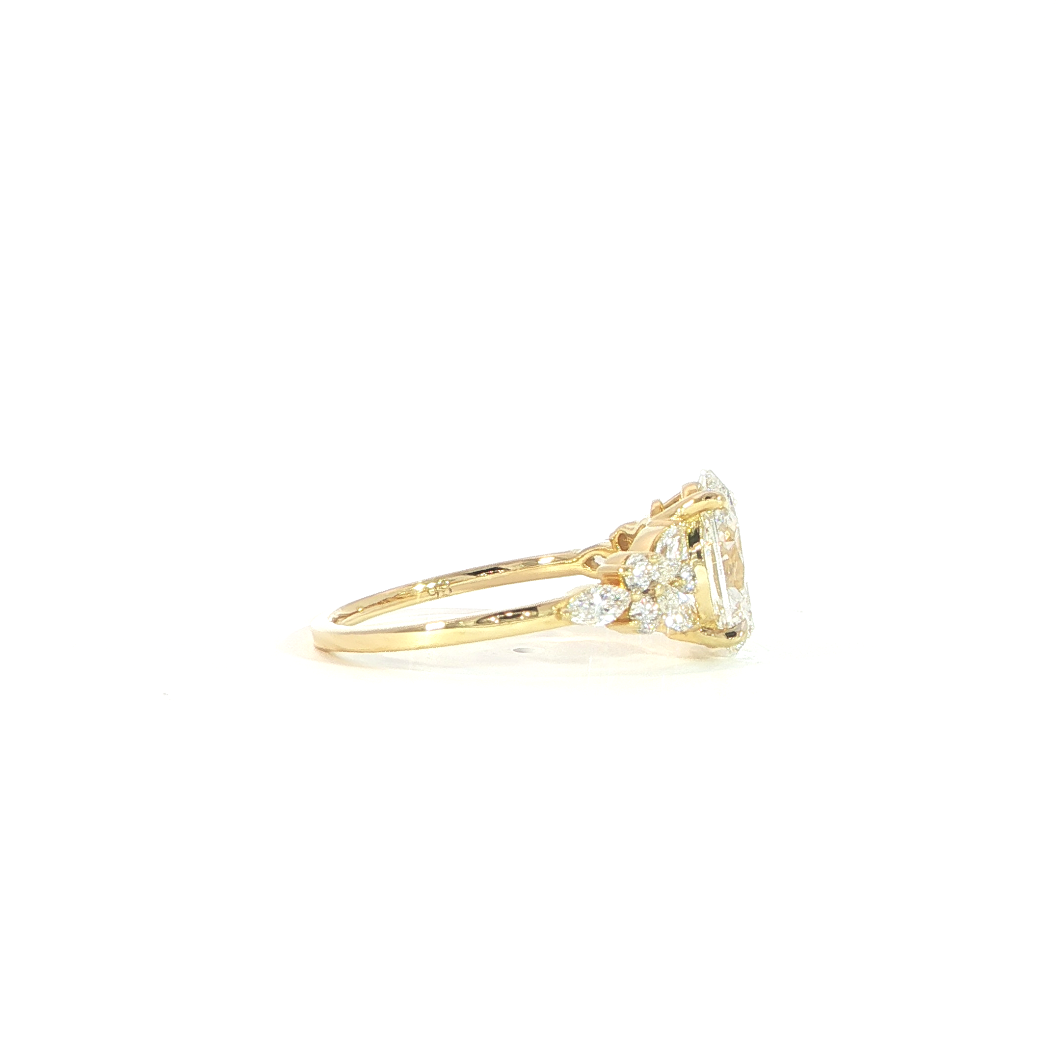 Oval diamond ring with side accents 14k gold side view
