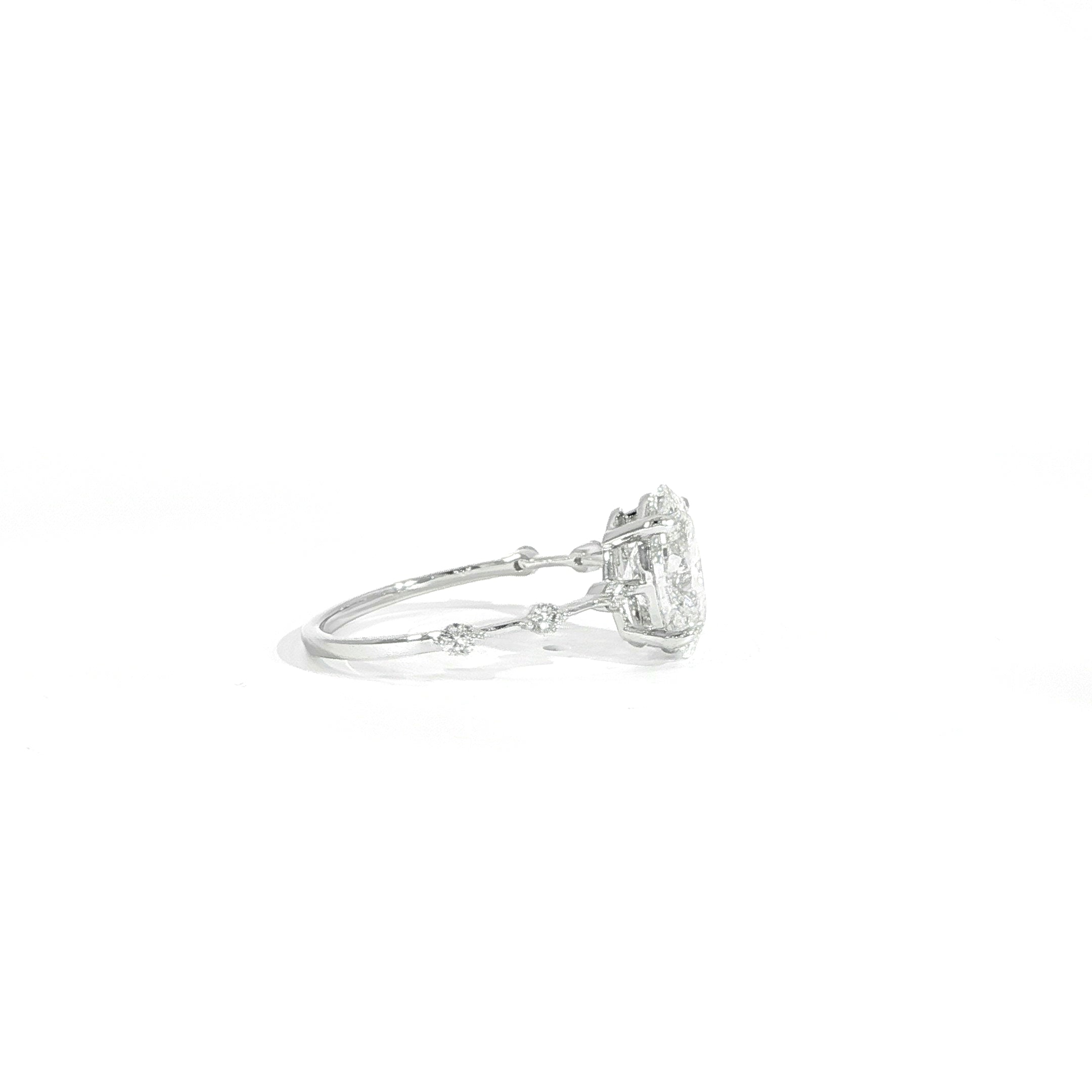 14K gold oval ring with subtle diamond station detailing