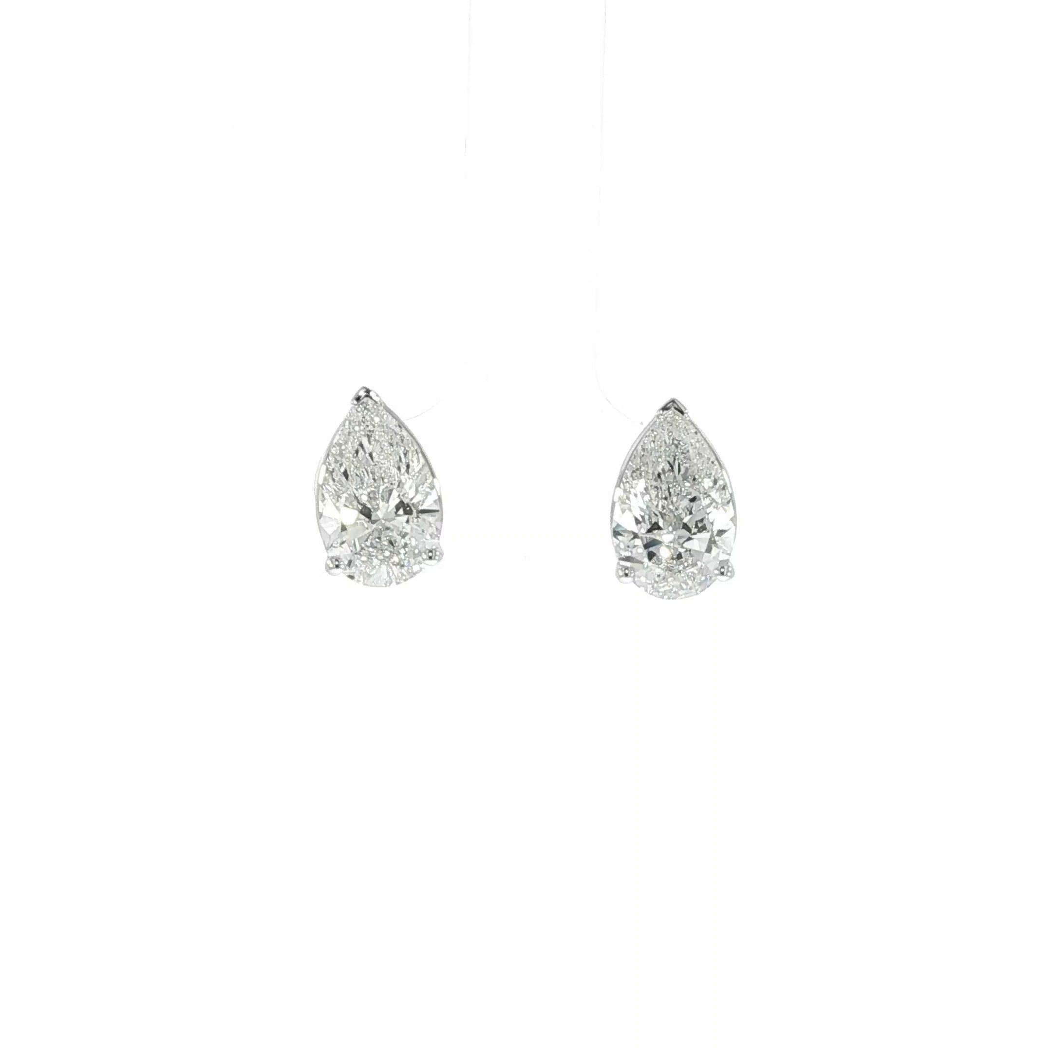 14K pear cut lab grown diamond earrings with screw backs and 4 carat total weight