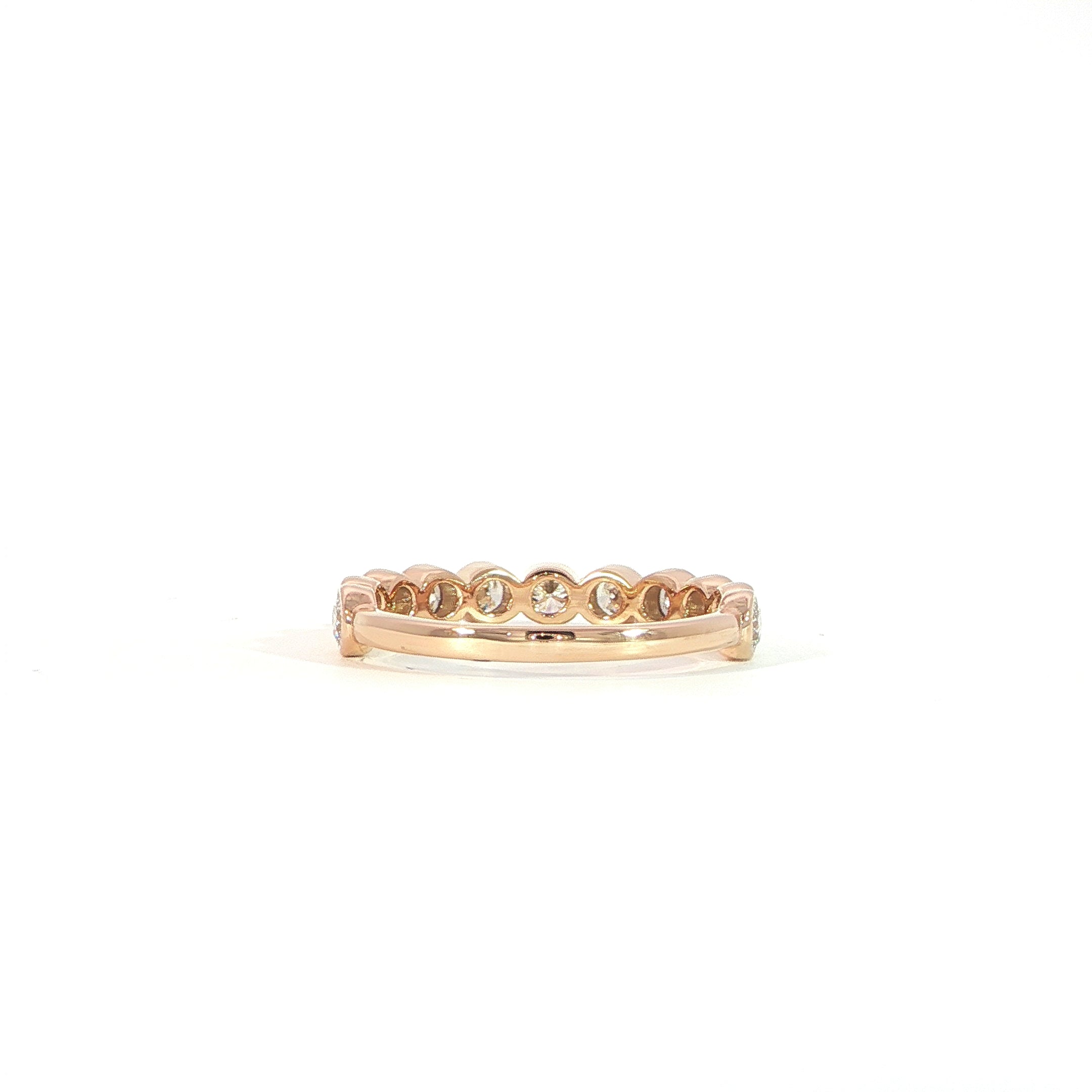 Back view of elegant round bezel diamond ring band in 14K rose gold
