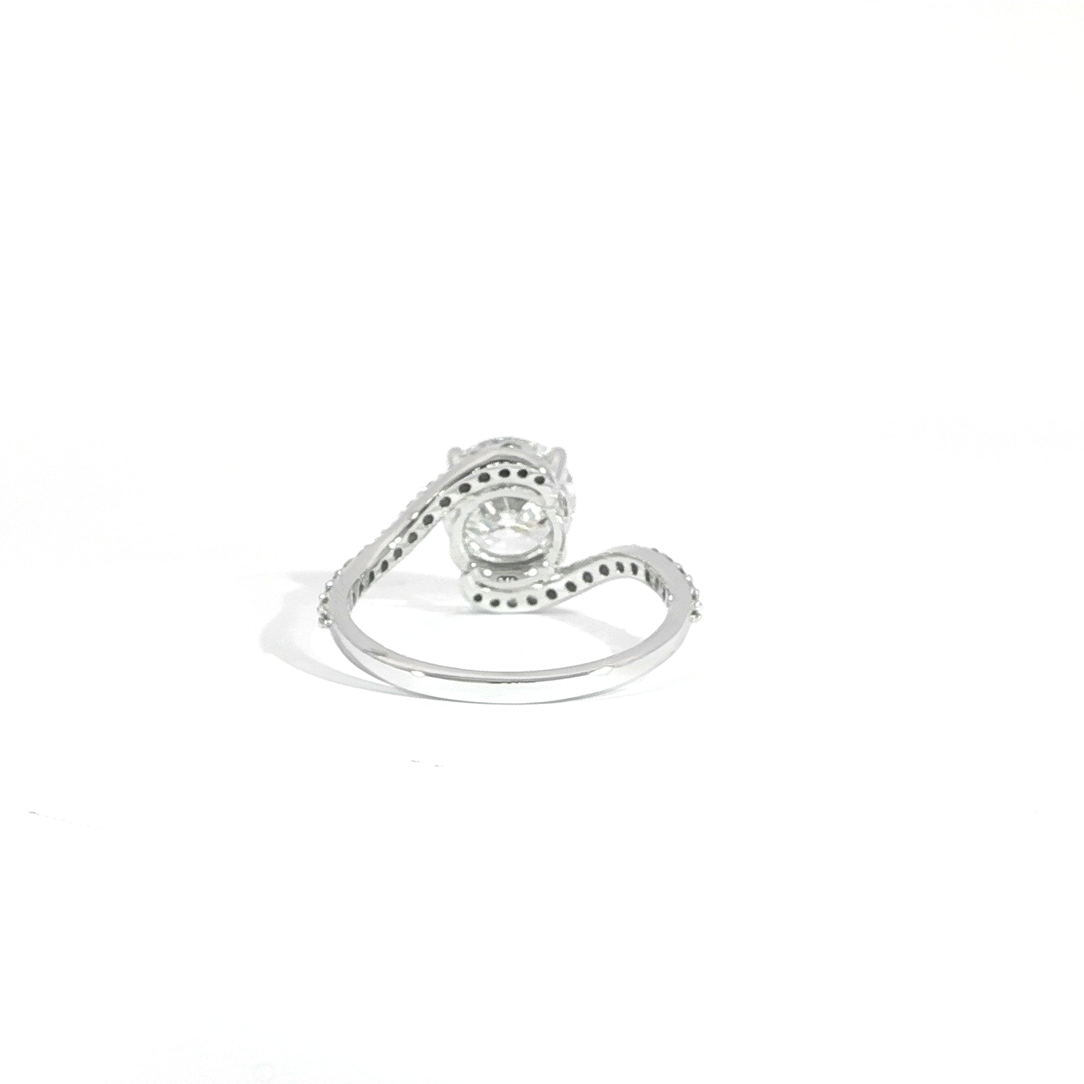 Back view of modern 2CT round diamond ring with curved bypass band