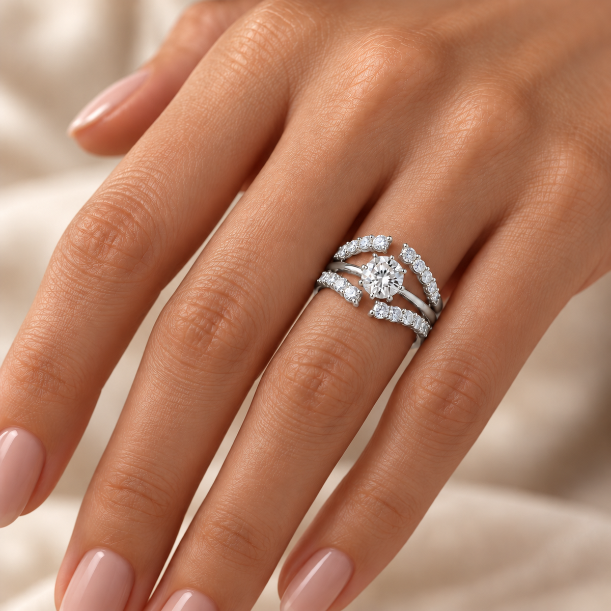 Model wearing modern round diamond ring enhancer in white gold