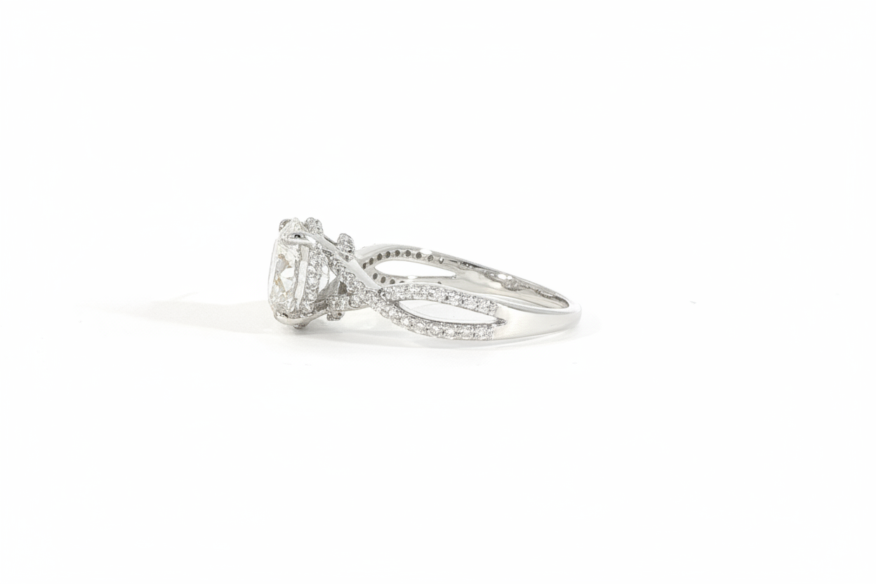 Side view detail of 14K white gold round engagement ring with hidden halo