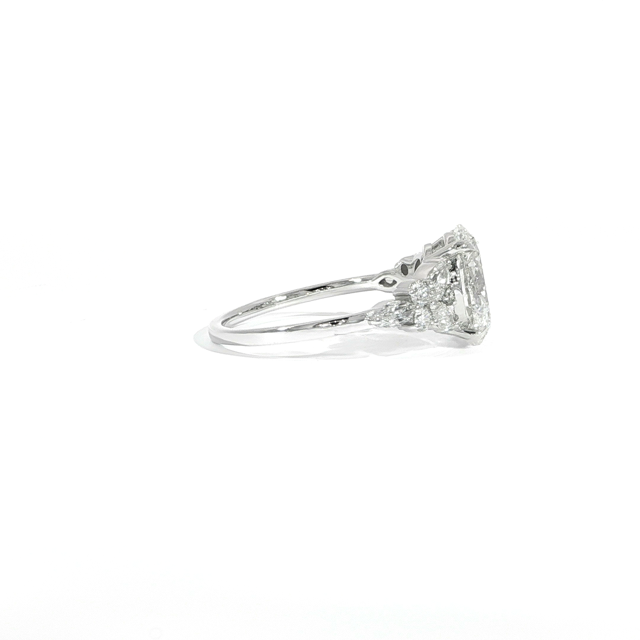 14k white gold oval diamond ring 2 carat center side view