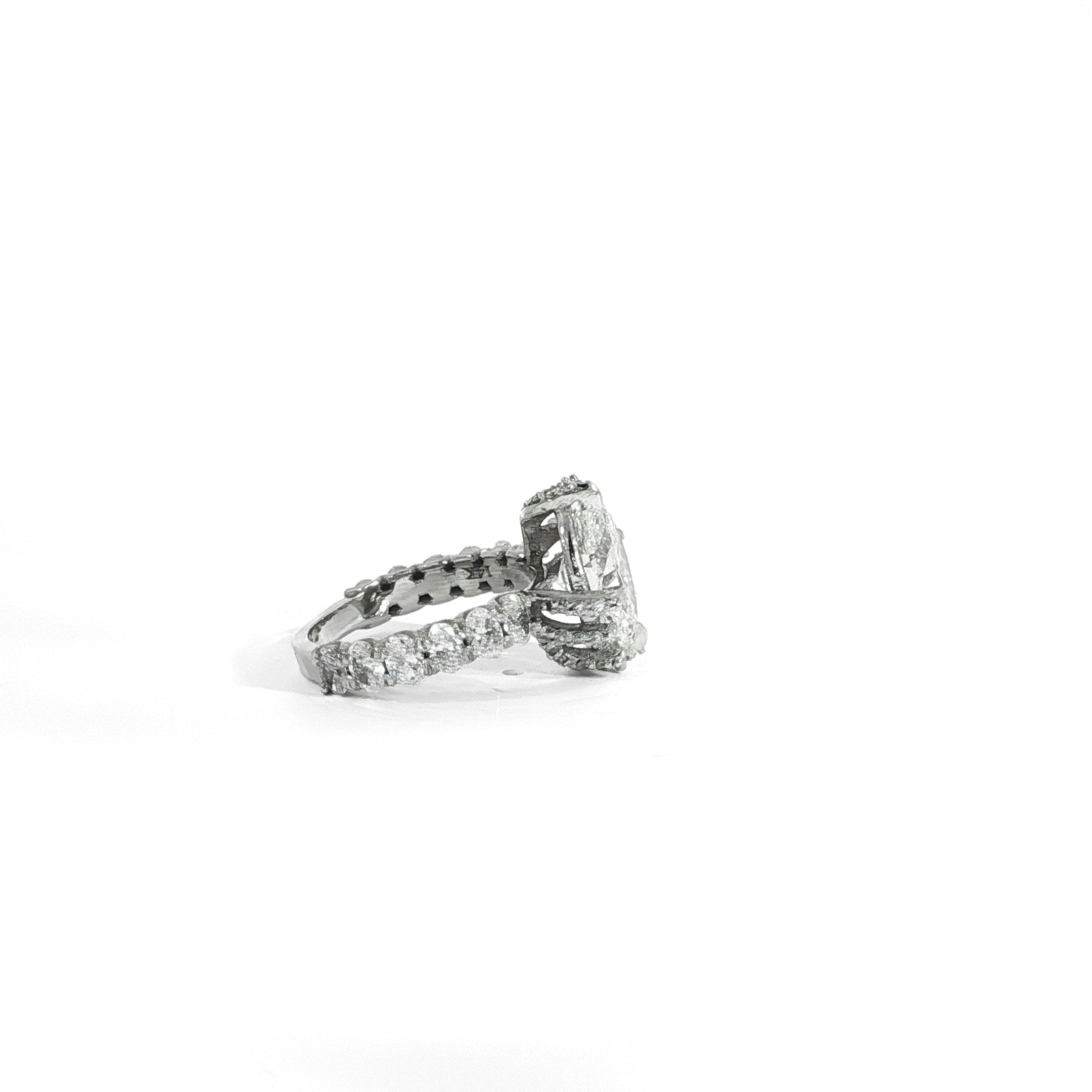 Nature-inspired diamond engagement ring with oval center stone