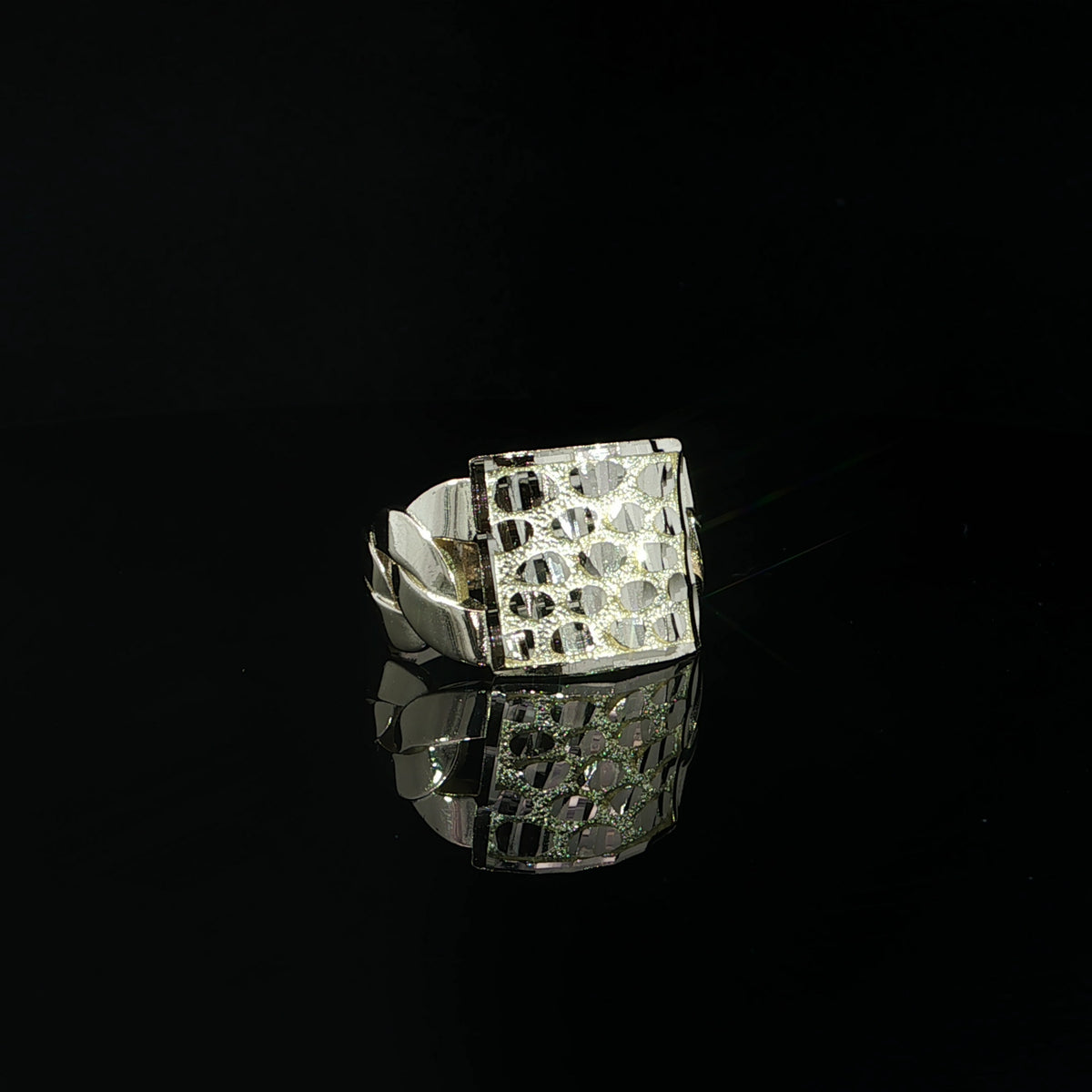Front view of a 14K yellow gold nugget ring with a 15 mm textured face and polished border.