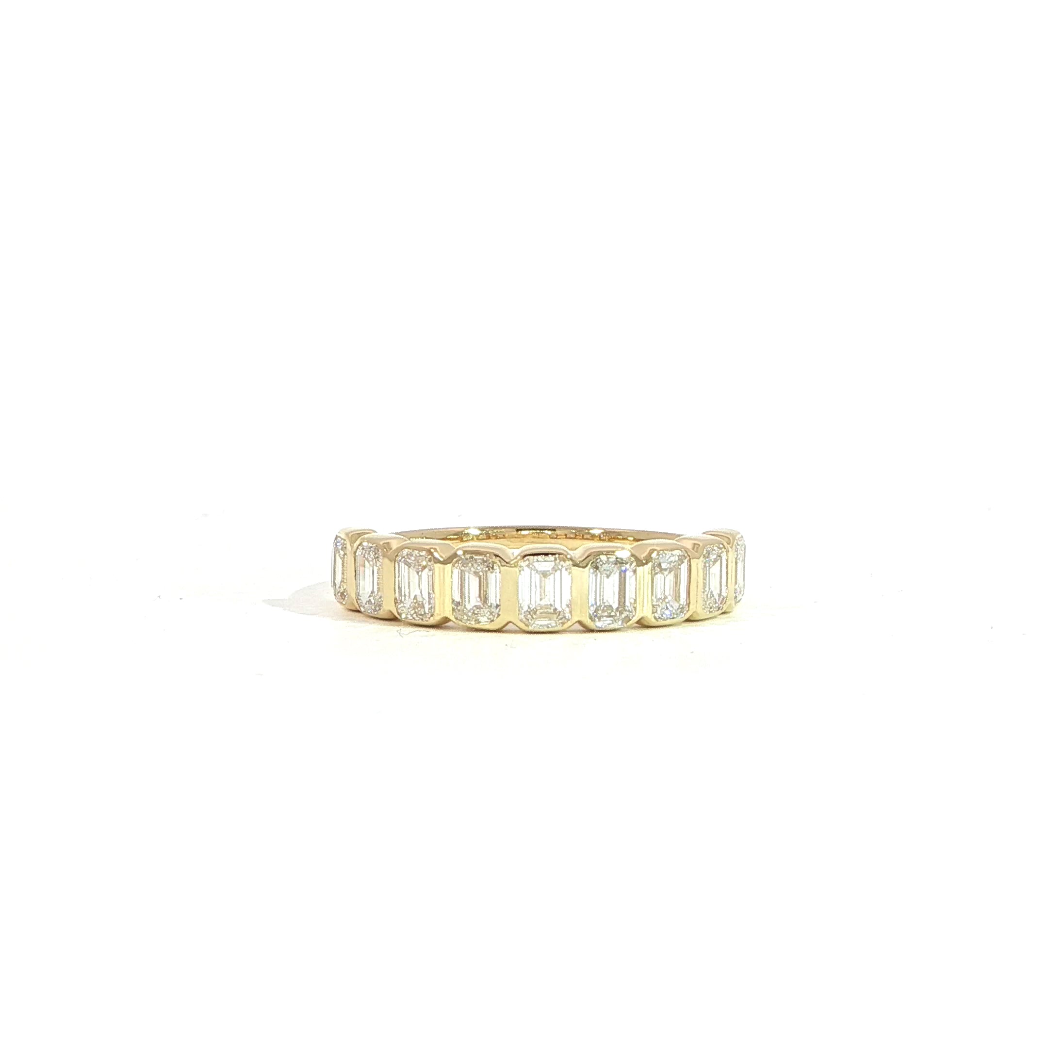 14K yellow gold half eternity band with bezel-set emerald cut lab diamonds 1.14 CTW