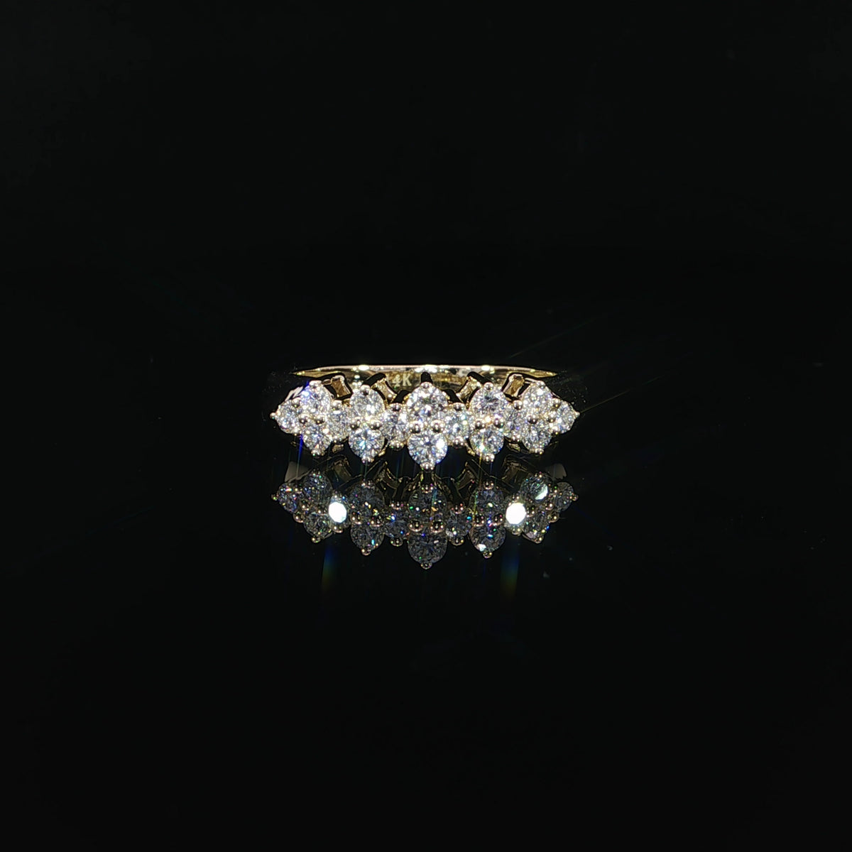 Yellow gold cluster ring featuring 0.58 CTW of round lab-grown diamonds across the top.