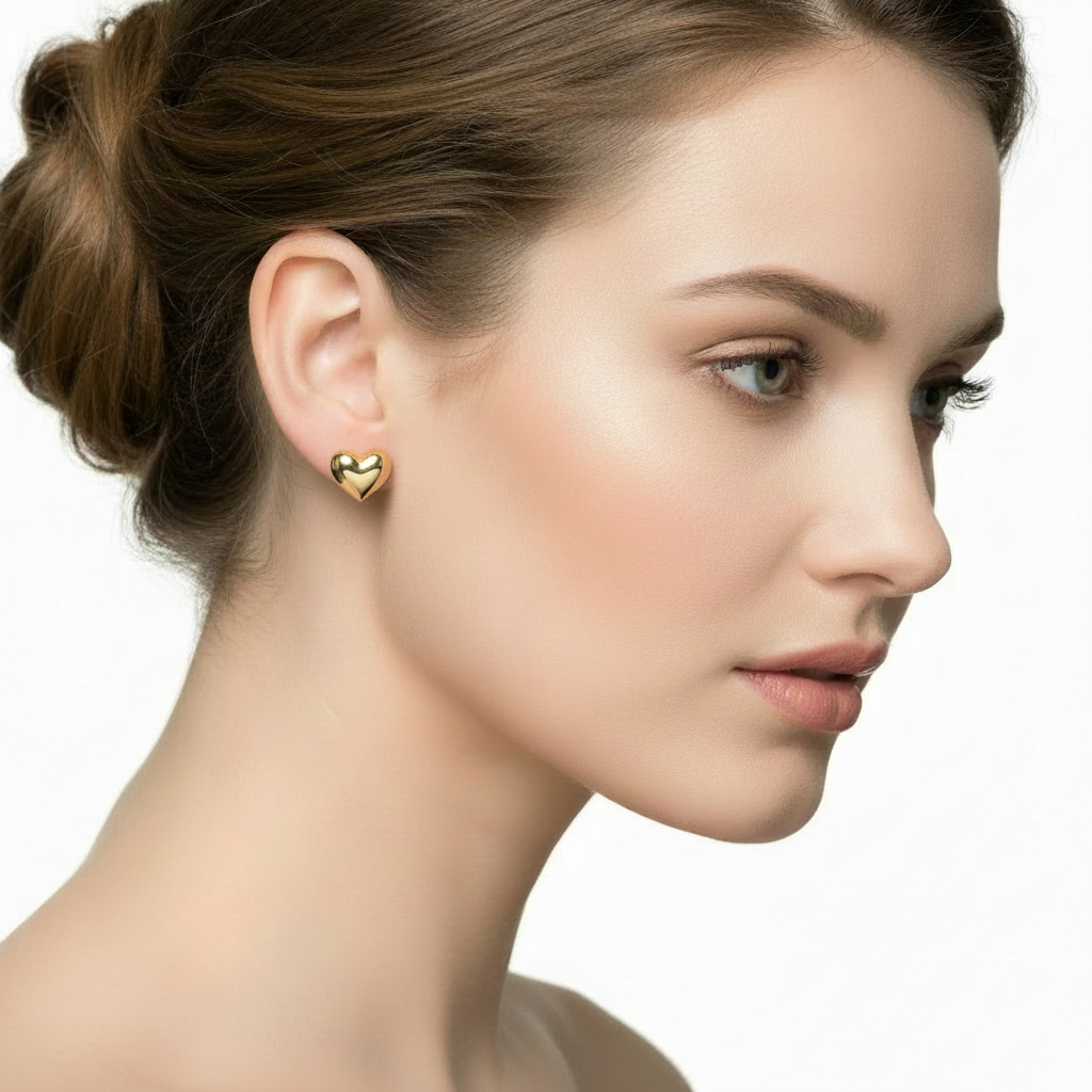 14K yellow gold puffy heart stud earrings with polished finish