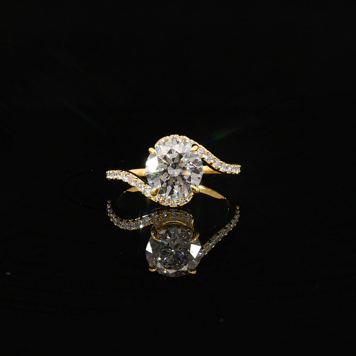 Close up 14K yellow gold 2CT round diamond engagement ring.