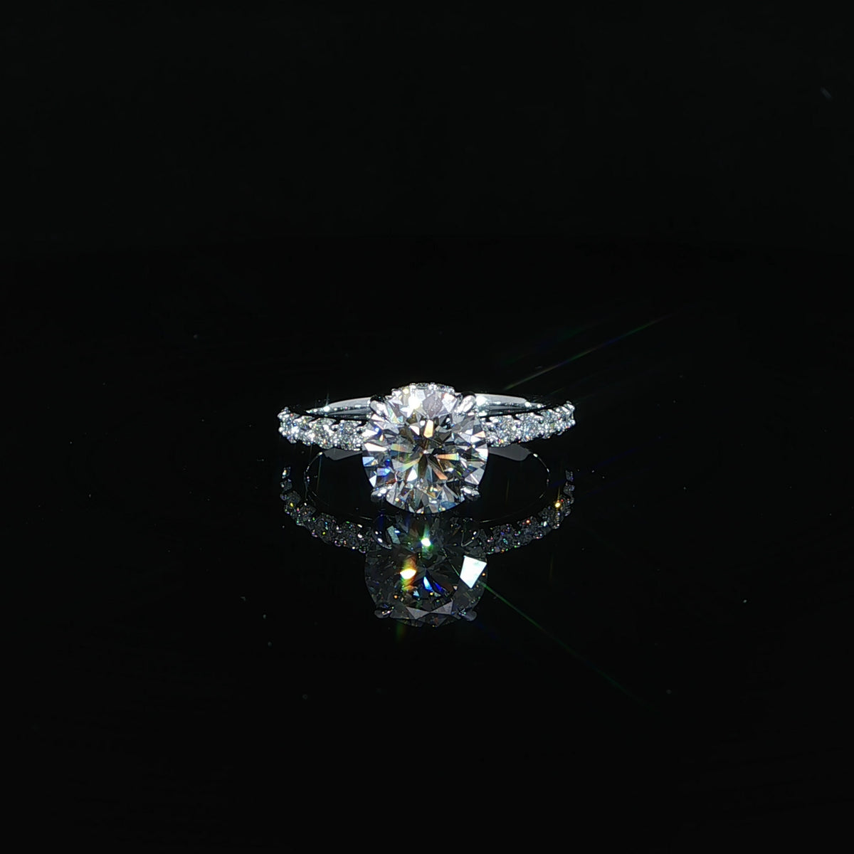 2.01-carat round lab-grown diamond engagement ring with a hidden halo in 14K white gold.