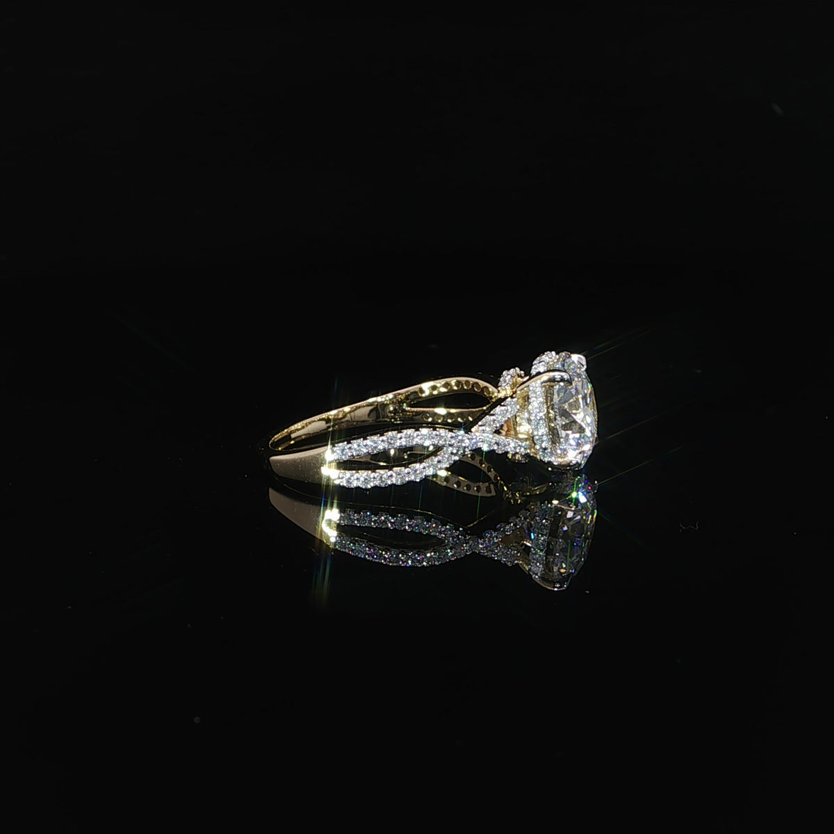 2.04-carat round lab-grown diamond engagement ring with a hidden halo and twist band in 14K yellow gold.